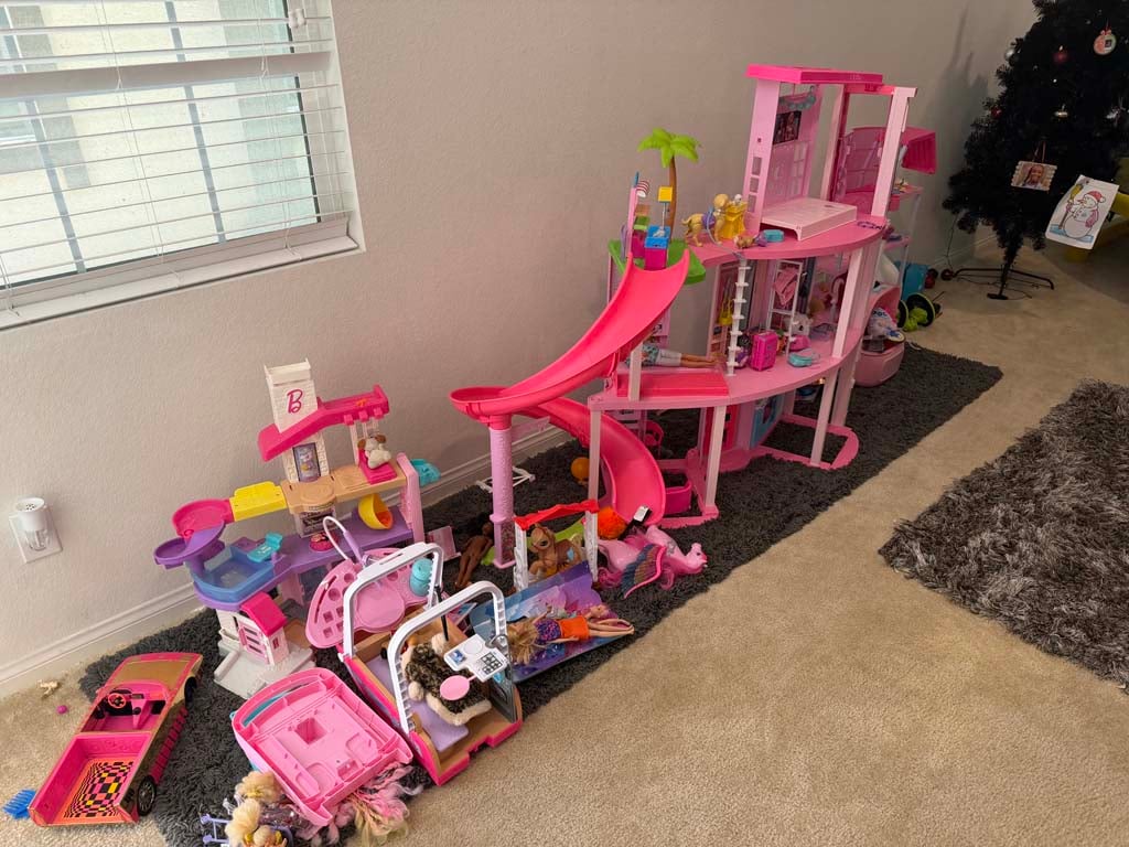 Dollhouse and children’s toys in abandoned property auction