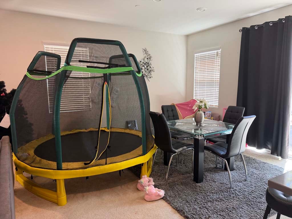 Dollhouse and children’s toys in abandoned property auction