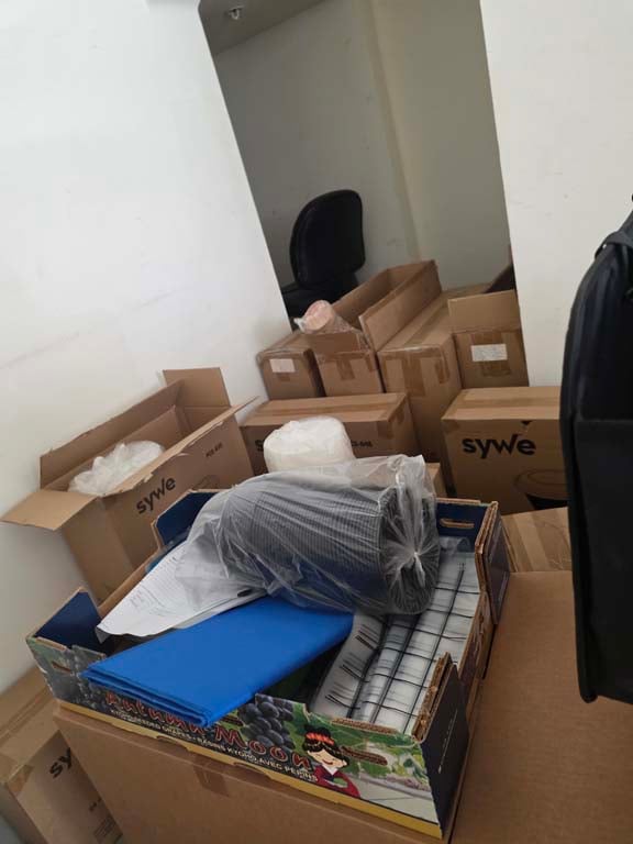 Boxes of take-out containers at Irvine CA liquidation auction