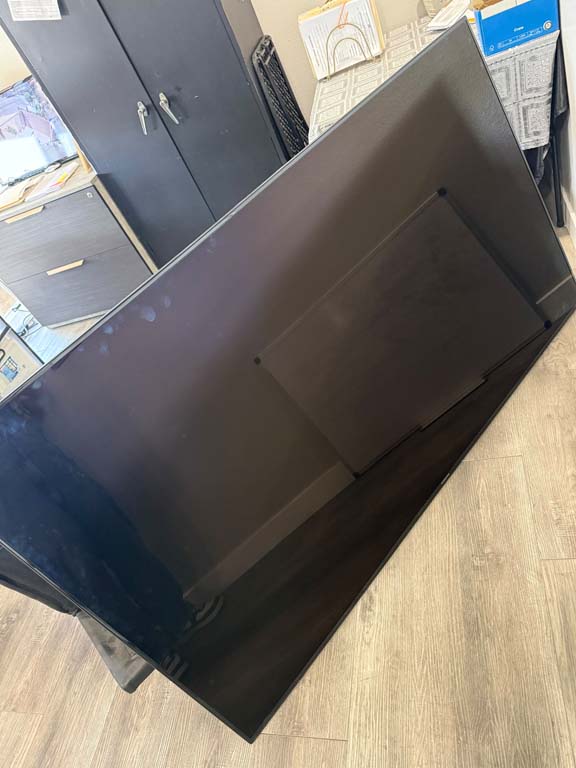 Wall-mounted flat-screen television in Los Angeles property auction